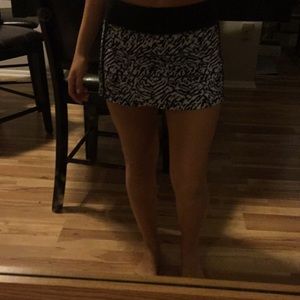 Lulu lemon, black and white tennis shirt